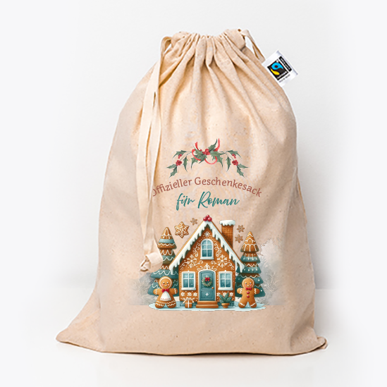 Weihnachtsgeschenk verpacken im Jutesack